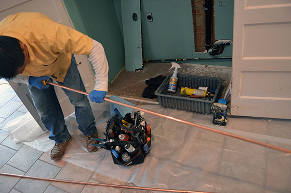 Vashon Island plumber works on a whole home copper re-pipe